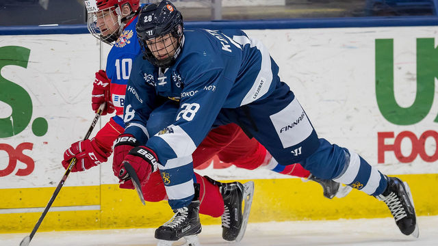 PLYMOUTH, MI - FEBRUARY 14: Jesperi Kotkaniemi #28 of the Finland Nationals battles for the puck with Pavel Rotenburg #10 of the Russian Nationals during the 2018 Under-18 Five Nations Tournament game at USA Hockey Arena on February 14, 2018 in Plymouth, Michigan. Russia defeated Finland 4-0. *** Local Caption *** Jesperi Kotkaniemi