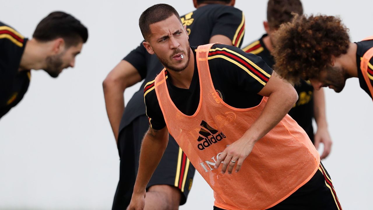 Belgium's forward Eden Hazard and team mates warm up during a training session at the Park arena in Sochi on June 16, 2018 at the Russia 2018 FIFA World Cup football tournament.