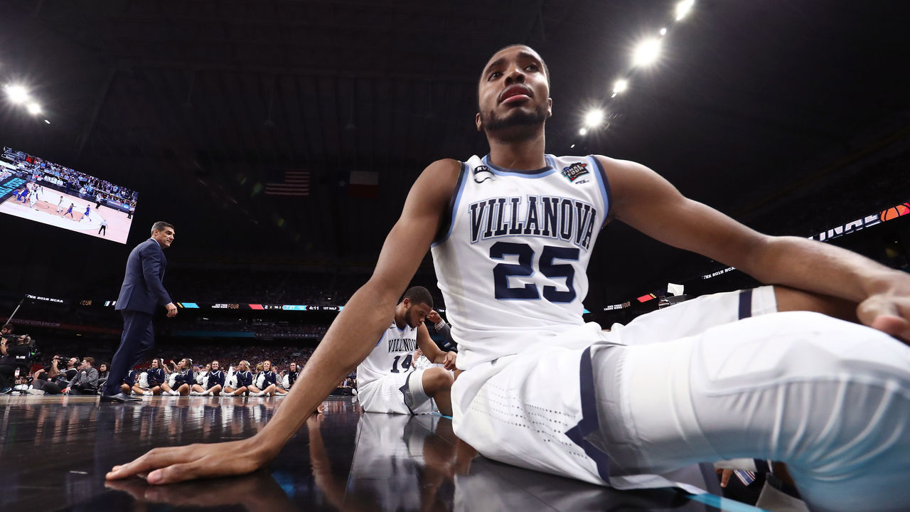 SAN ANTONIO, TX - MARCH 31: Mikal Bridges #25 of the Villanova Wildcats looks on from the bench in the first half against the Kansas Jayhawks during the 2018 NCAA Men's Final Four Semifinal at the Alamodome on March 31, 2018 in San Antonio, Texas.