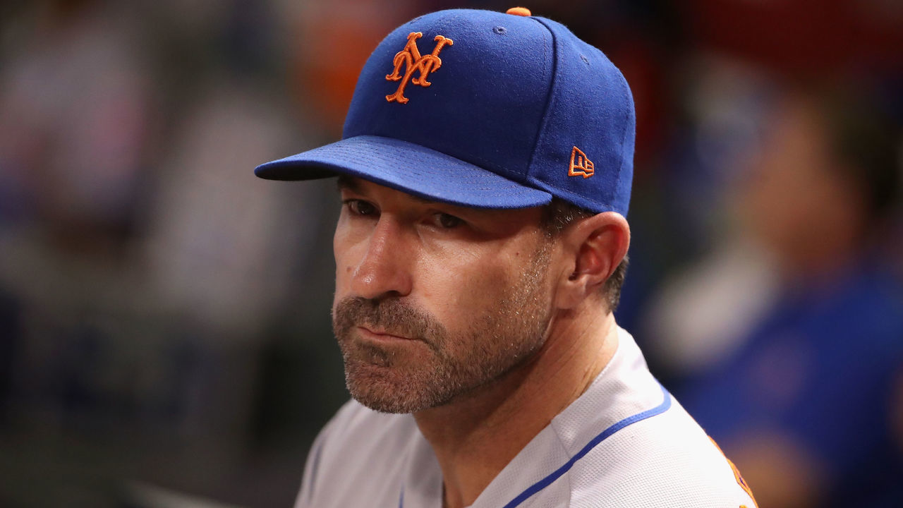 PHOENIX, AZ - JUNE 15: Manager Mickey Callaway #36 of the New York Mets watches from the dugout during the MLB game against the Arizona Diamondbacks at Chase Field on June 15, 2018 in Phoenix, Arizona.