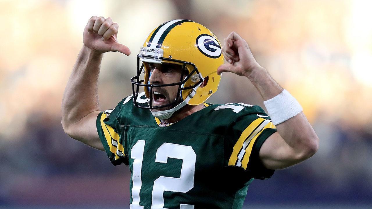 ARLINGTON, TX - OCTOBER 08: Aaron Rodgers #12 of the Green Bay Packers reacts after throwing the game winning touchdown against the Dallas Cowboys in the fourth quarter at AT&T Stadium on October 8, 2017 in Arlington, Texas.