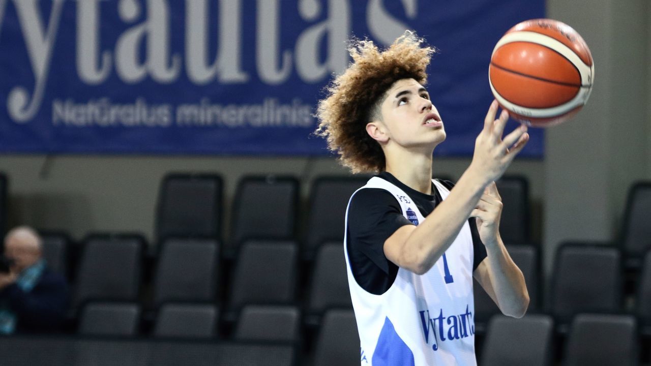 US basketball player Lamelo Ball takes part in his first training session in Prienai, Lithuania, where he will play for the Vytautas club on January 5, 2018. Basketball-crazed Lithuania welcomed LiAngelo and LaMelo Ball, the two youngest sons of flamboyant Los Angeles entrepreneur LaVar Ball who recently made headlines due to a feud with US President Donald Trump. / AFP PHOTO / Petras Malukas