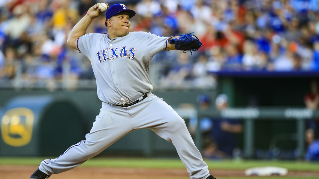 KANSAS CITY, MO - JUNE 18: Bartolo Colon #40 of the Texas Rangers pitches against the Kansas City Royals during the first inning at Kauffman Stadium on June 18, 2018 in Kansas City, Missouri.