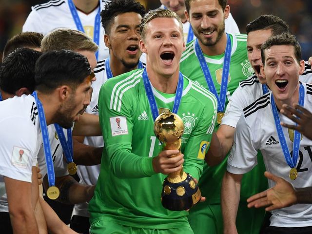 Germany's goalkeeper Bernd Leno holds the trophy after they beat Chile 1-0 in the 2017 Confederations Cup final football match between Chile and Germany at the Saint Petersburg Stadium in Saint Petersburg on July 2, 2017. / AFP PHOTO / FRANCK FIFE