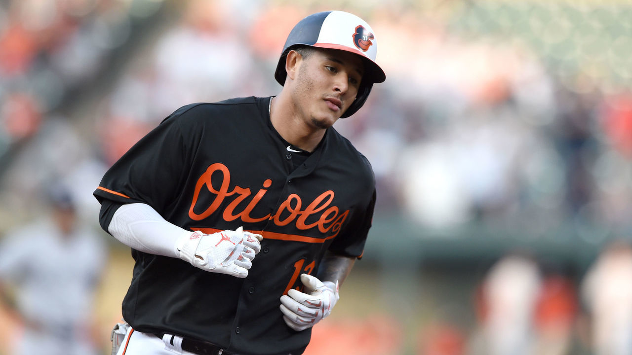 BALTIMORE, MD - JUNE 01: Manny Machado #13 of the Baltimore Orioles rounds the bases after hitting a home run during a baseball game against the New York Yankees at Oriole Park at Camden Yards on June 1, 2018 in Baltimore, Maryland.