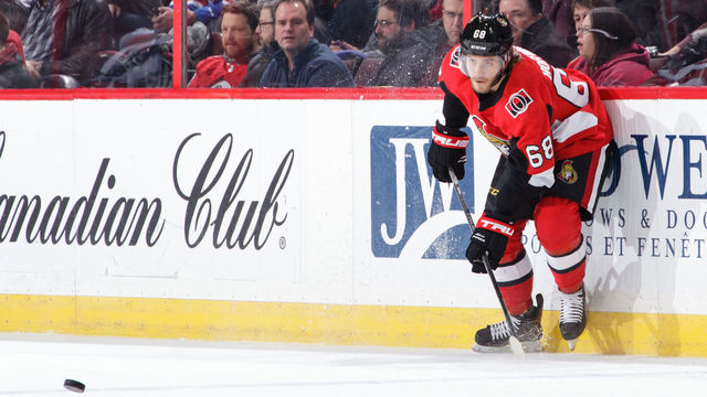 OTTAWA, ON - DECEMBER 4: Mike Hoffman #68 of the Ottawa Senators passes the puck against the New York Rangers at Canadian Tire Centre on December 4, 2017 in Ottawa, Ontario, Canada.