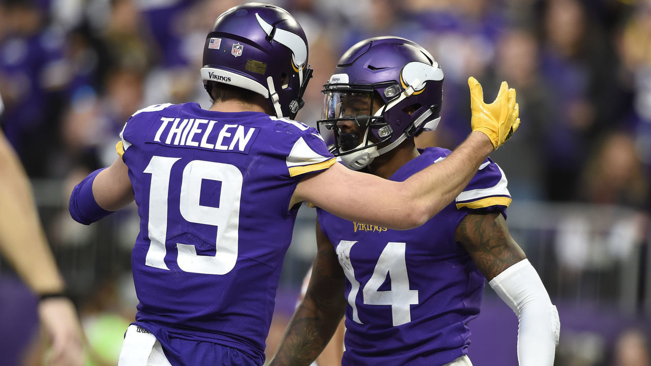 MINNEAPOLIS, MN - DECEMBER 31: Stefon Diggs #14 of the Minnesota Vikings celebrates with teammate Adam Thielen #19 after scoring a touchdown in the third quarter of the game against the Chicago Bears on December 31, 2017 at U.S. Bank Stadium in Minneapolis, Minnesota.