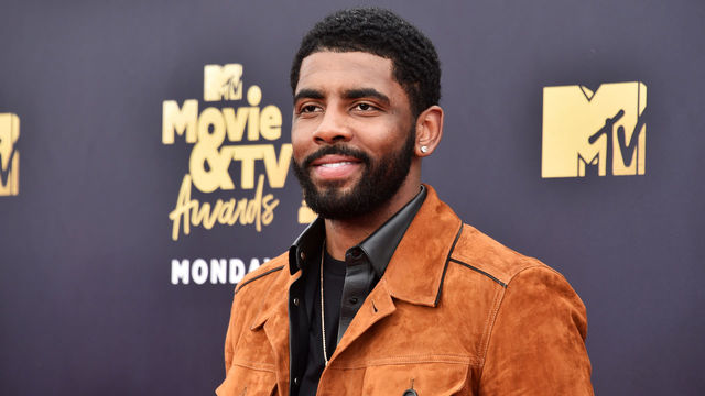 SANTA MONICA, CA - JUNE 16: Basketball player Kyrie Irving attends the 2018 MTV Movie And TV Awards at Barker Hangar on June 16, 2018 in Santa Monica, California.