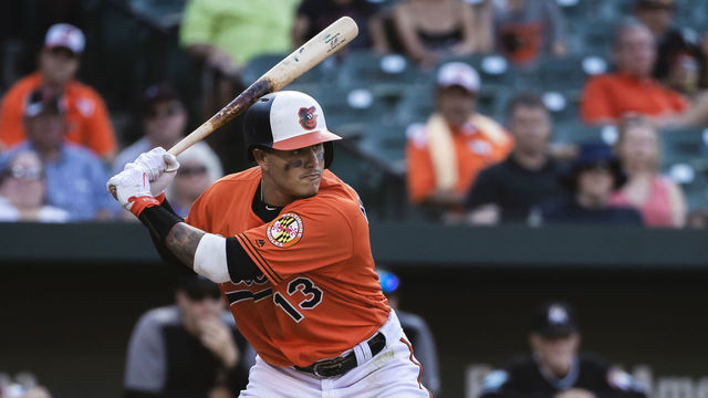 BALTIMORE, MD - JUNE 16: Manny Machado #13 of the Baltimore Orioles at bat during the ninth inning against the Miami Marlins at Oriole Park at Camden Yards on June 16, 2018 in Baltimore, Maryland.