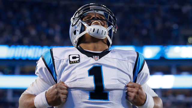 CHARLOTTE, NC - JANUARY 24: Cam Newton #1 of the Carolina Panthers celebrates after scoring a touchdown in the third quarter against the Arizona Cardinals during the NFC Championship Game at Bank of America Stadium on January 24, 2016 in Charlotte, North Carolina.