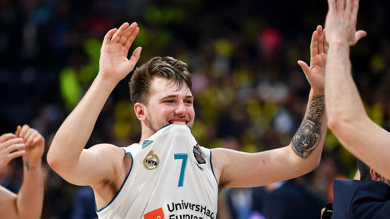 Real Madrid's Slovenian Luka Doncic celebrates their 85-80 win in the Euroleague Final Four finals basketball match between Real Madrid and Fenerbahce Dogus Istanbul at The Stark Arena in Belgrade on May 20, 2018.