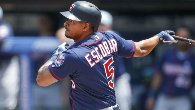 CLEVELAND, OH - JUNE 17: Eduardo Escobar #5 of the Minnesota Twins hits a one run double off starting pitcher Shane Bieber #57 of the Cleveland Indians during the first inning at Progressive Field on June 17, 2018 in Cleveland, Ohio.