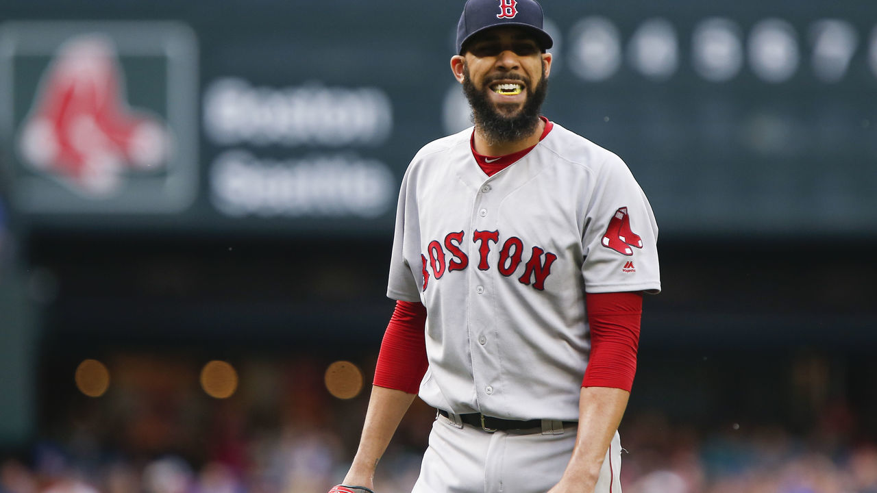SEATTLE, WA - JUNE 14: David Price #24 of the Boston Red Sox walks off the mound to speak to the home plate umpire after pitching in the first inning against the Seattle Mariners at Safeco Field on June 14, 2018 in Seattle, Washington.