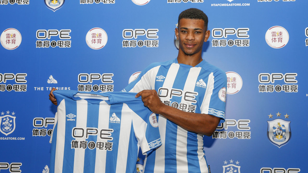 HUDDERSFIELD, ENGLAND - JUNE 19: New signing Juninho Bacuna has agreed to sign for Premier League side Huddersfield Town from the Dutch Eredivisie side Groningen on June 19, 2018 in Huddersfield, England.