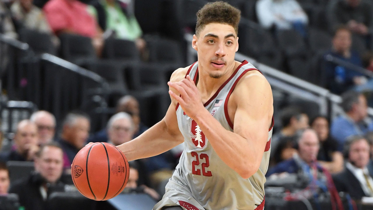 LAS VEGAS, NV - MARCH 07: Reid Travis #22 of the Stanford Cardinal brings the ball up the court agfainst the California Golden Bears during a first-round game of the Pac-12 basketball tournament at T-Mobile Arena on March 7, 2018 in Las Vegas, Nevada. The Cardinal won 76-58.