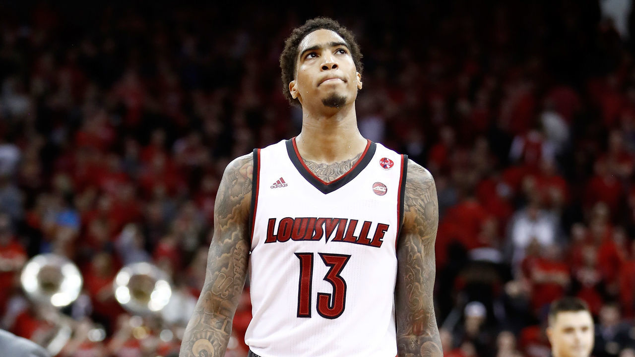 LOUISVILLE, KY - MARCH 01: Ray Spalding #13 of the Louisville Cardinals walks off of the court after a three point basket at the buzzer by De'Andre Hunter #12 of the Virginia Cavaliers beat the Cardinals 67-66 at KFC YUM! Center on March 1, 2018 in Louisville, Kentucky.