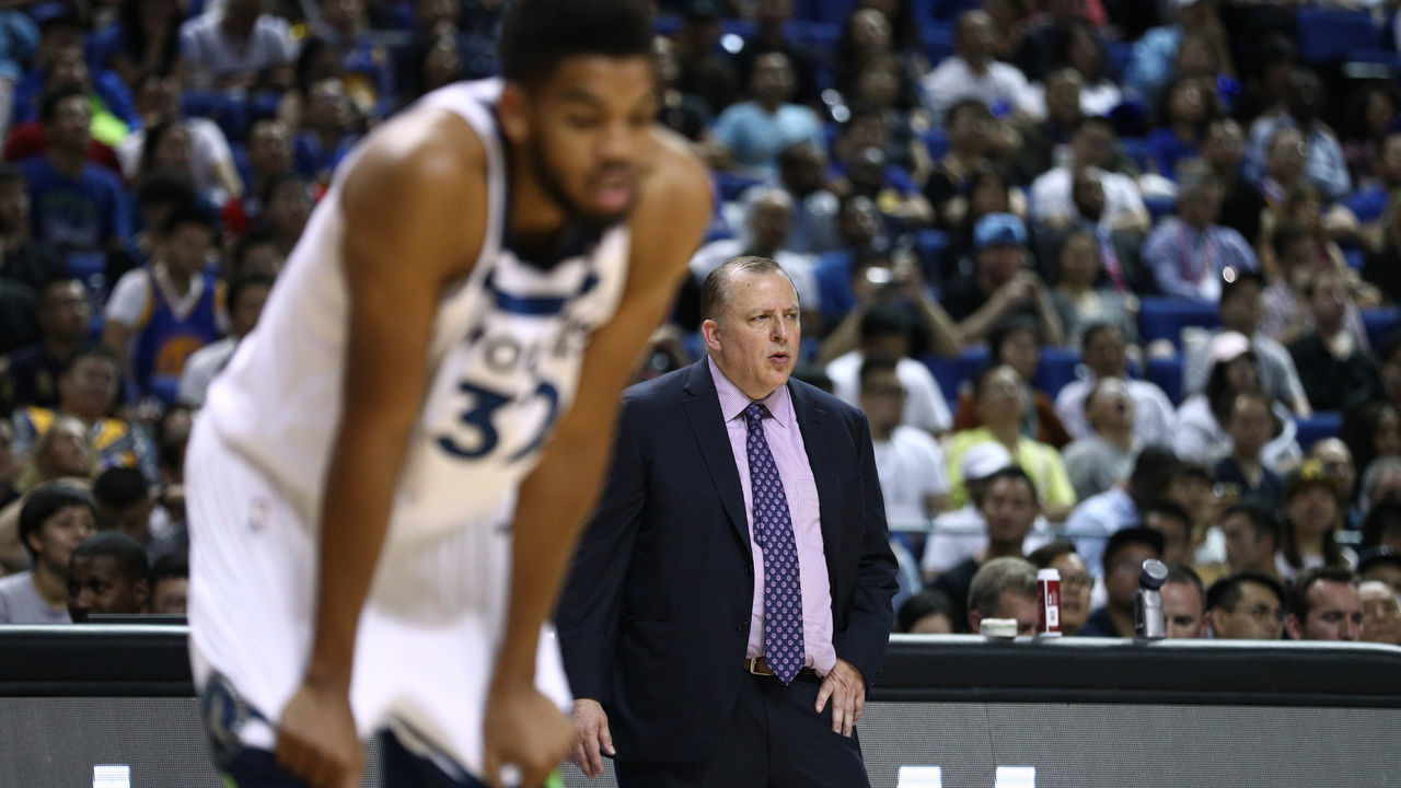 SHANGHAI, CHINA - OCTOBER 08: Head coach Tom Thibodeau of the Minnesota Timberwolves looks on as Karl-Anthony Towns #32 of the Minnesota Timberwolves on court during the game between the Minnesota Timberwolves and the Golden State Warriors as part of 2017 NBA Global Games China at Mercedes-Benz Arena on October 8, 2017 in Shanghai, China.