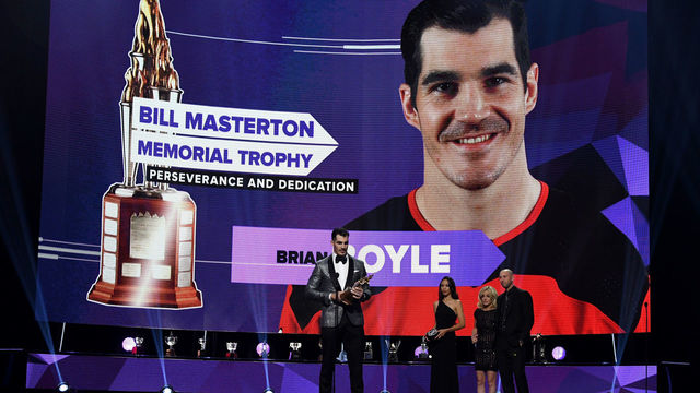 LAS VEGAS, NV - JUNE 20: Brian Boyle of the New Jersey Devils accepts the Bill Masterton Memorial Trophy for perseverance and dedication to hockey onstage at the 2018 NHL Awards presented by Hulu at The Joint inside the Hard Rock Hotel & Casino on June 20, 2018 in Las Vegas, Nevada.