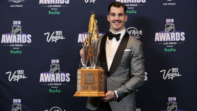 LAS VEGAS, NV - JUNE 20: Brian Boyle of the New Jersey Devils poses with the Bill Masterton Memorial Trophy for perseverance and dedication to hockey in the press room at the 2018 NHL Awards presented by Hulu at the Hard Rock Hotel & Casino on June 20, 2018 in Las Vegas, Nevada.