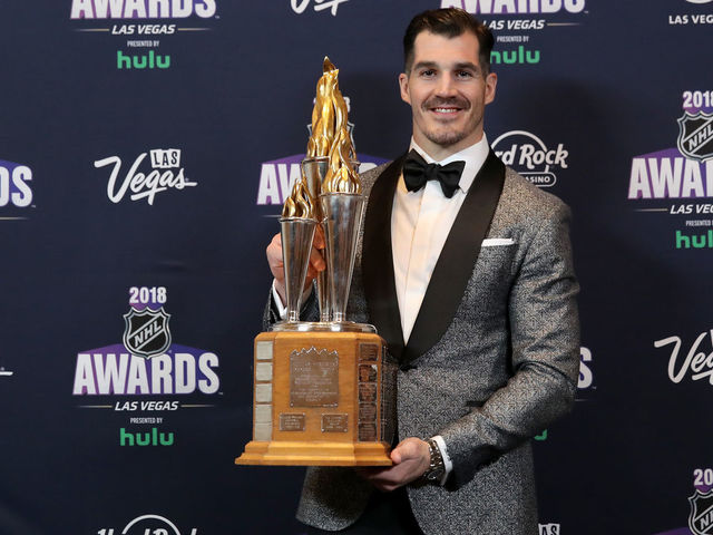 LAS VEGAS, NV - JUNE 20: Brian Boyle of the New Jersey Devils poses with the Bill Masterton Memorial Trophy for perseverance and dedication to hockey in the press room at the 2018 NHL Awards presented by Hulu at the Hard Rock Hotel & Casino on June 20, 2018 in Las Vegas, Nevada.