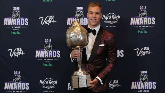 LAS VEGAS, NV - JUNE 20: Taylor Hall of the New Jersey Devils poses with the Hart Trophy given to the most valuable player to his team in the press room at the 2018 NHL Awards presented by Hulu at the Hard Rock Hotel & Casino on June 20, 2018 in Las Vegas, Nevada.