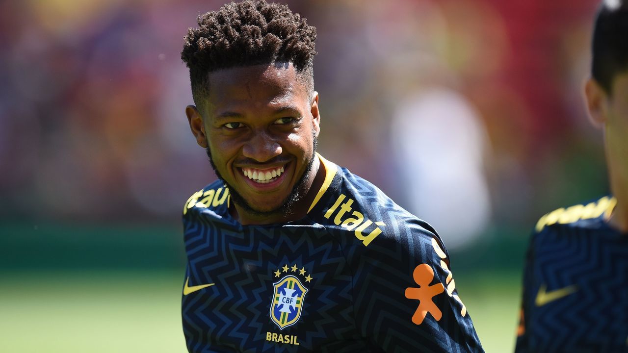 Brazil's midfielder Fred smiles as he warms up ahead of the International friendly football match between Brazil and Croatia at Anfield in Liverpool on June 3, 2018.