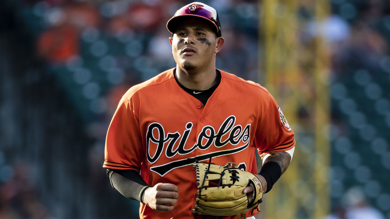 BALTIMORE, MD - JUNE 16: Manny Machado #13 of the Baltimore Orioles heads to the dugout during the ninth inning against the Miami Marlins at Oriole Park at Camden Yards on June 16, 2018 in Baltimore, Maryland.