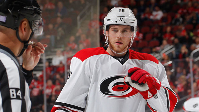NEWARK, NJ - NOVEMBER 08: Elias Lindholm #16 of the Carolina Hurricanes waits for a faceoff during an NHL hockey game against the New Jersey Devils at the Prudential Center on November 8, 2016 in Newark, New Jersey. Devils won 3-2 in a shootout.