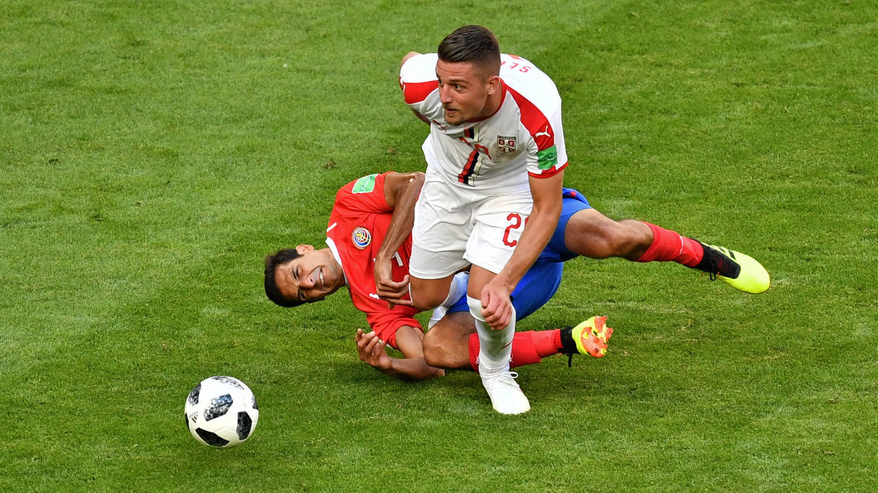 Serbia's midfielder Sergej Milinkovic-Savic (R) vies for the ball with Costa Rica's defender Johnny Acosta during the Russia 2018 World Cup Group E football match between Costa Rica and Serbia at the Samara Arena in Samara on June 17, 2018.
