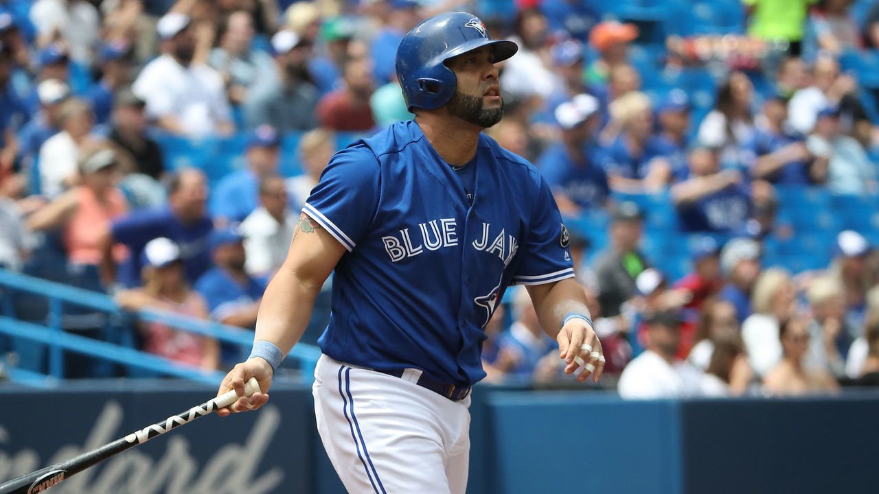 TORONTO, ON - JUNE 20: Kendrys Morales #8 of the Toronto Blue Jays hits a two-run home run in the first inning during MLB game action against the Atlanta Braves at Rogers Centre on June 20, 2018 in Toronto, Canada.