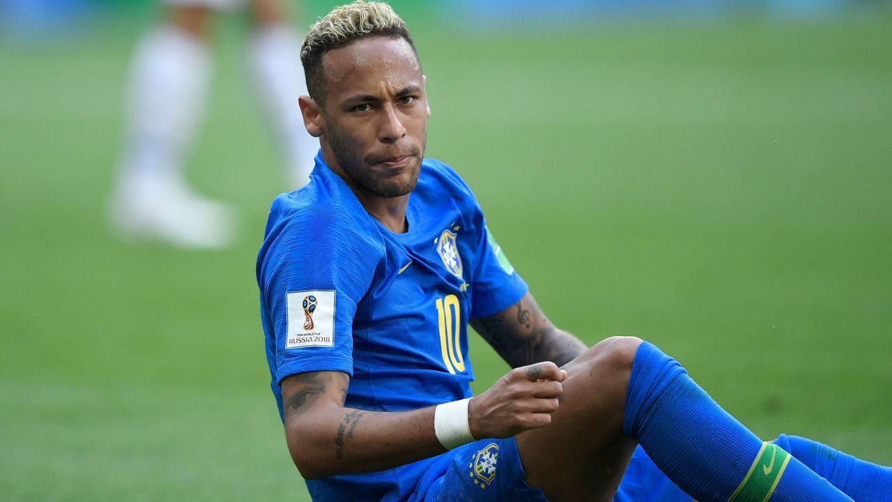 Brazil's forward Neymar sits on the ground during the Russia 2018 World Cup Group E football match between Brazil and Costa Rica at the Saint Petersburg Stadium in Saint Petersburg on June 22, 2018.