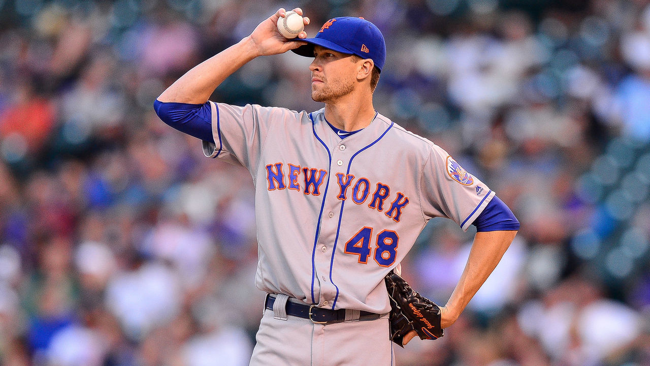 DENVER, CO - JUNE 18: Jacob deGrom #48 of the New York Mets reacts after allowing consecutive doubles in the second inning of a game at Coors Field on June 18, 2018 in Denver, Colorado.