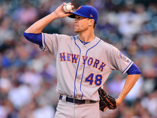 DENVER, CO - JUNE 18: Jacob deGrom #48 of the New York Mets reacts after allowing consecutive doubles in the second inning of a game at Coors Field on June 18, 2018 in Denver, Colorado.