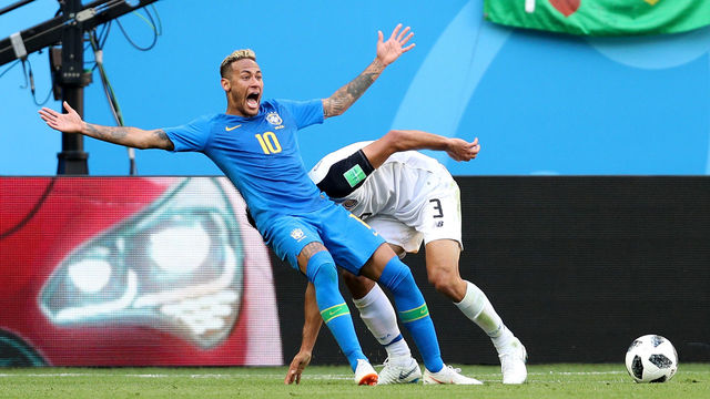 SAINT PETERSBURG, RUSSIA - JUNE 22: Neymar Jr of Brazil goes down in the penalty area after a challenge from Giancarlo Gonzalez of Costa Rica and a penalty is awarded by referee Bjorn Kuipers, before being rescinded after a VAR review during the 2018 FIFA World Cup Russia group E match between Brazil and Costa Rica at Saint Petersburg Stadium on June 22, 2018 in Saint Petersburg, Russia.