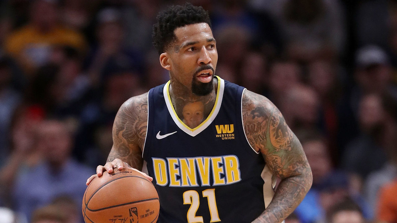 DENVER, CO - JANUARY 19: Wilson Chandler #21 of the Denver Nuggets brings the ball down the court against the Phoenix Suns at the Pepsi Center on January 19, 2018 in Denver, Colorado.