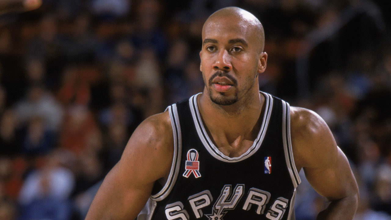 SEATTLE, WA - MARCH 29: Foward Bruce Bowen #12 of the San Antonio Spurs holds the ball, during the NBA game against the Seattle SuperSonics at the Key Arena in Seattle, Washington on March 29, 2002. The Sonics won, 79-76. NOTE TO USER: User expressly acknowledges and agrees that, by downloading and/or using this Photograph, User is consenting to the terms and conditions of the Getty Images License Agreement.