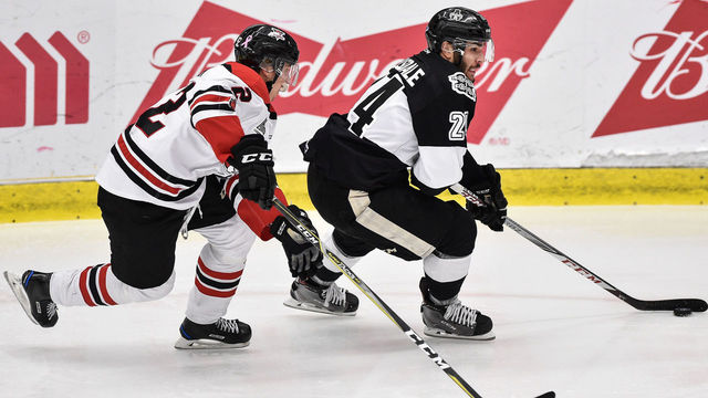 BOISBRIAND, QC - OCTOBER 27: Joel Teasdale #24 of the Blainville-Boisbriand Armada skates the puck against Nicolas Beaudin #92 of the Drummondville Voltigeurs during the QMJHL game at Centre d'Excellence Sports Rousseau on October 27, 2017 in Boisbriand, Quebec, Canada.