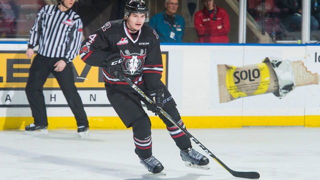 KELOWNA, BC - FEBRUARY 14: Alexander Alexeyev #4 of the Red Deer Rebels looks for the pass against the Kelowna Rockets at Prospera Place on February 14, 2018 in Kelowna, Canada.