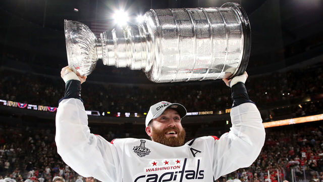 LAS VEGAS, NV - JUNE 07: Brooks Orpik #44 of the Washington Capitals hoists the Stanley Cup after his team defeated the Vegas Golden Knights 4-3 in Game Five of the 2018 NHL Stanley Cup Final at T-Mobile Arena on June 7, 2018 in Las Vegas, Nevada.