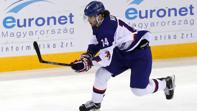 BUDAPEST, HUNGARY - APRIL 28: (L-R) Zsombor Garat of Hungary leaves Liam Kirk of Great Britain behind during the 2018 IIHF Ice Hockey World Championship Division I Group A match between Hungary and Great Britain at Laszlo Papp Budapest Sports Arena on April 28, 2018 in Budapest, Hungary.