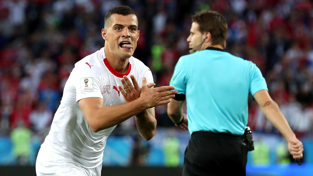 KALININGRAD, RUSSIA - JUNE 22: Granit Xhaka of Switzerland celebrates after scoring his team's first goal during the 2018 FIFA World Cup Russia group E match between Serbia and Switzerland at Kaliningrad Stadium on June 22, 2018 in Kaliningrad, Russia.