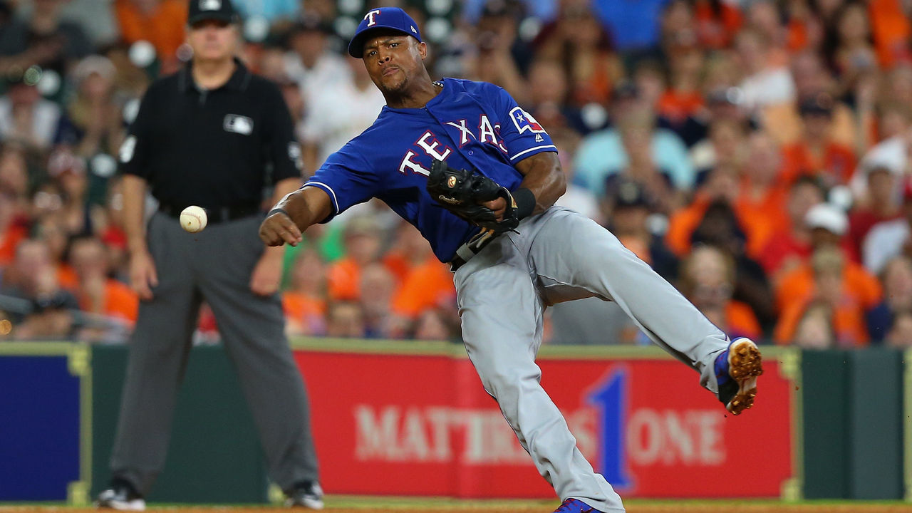 HOUSTON, TX - MAY 11: Adrian Beltre #29 of the Texas Rangers throws to first base in the fourth inning attempting to throw out Marwin Gonzalez #9 of the Houston Astros at Minute Maid Park on May 11, 2018 in Houston, Texas. An error was issued on the throw.