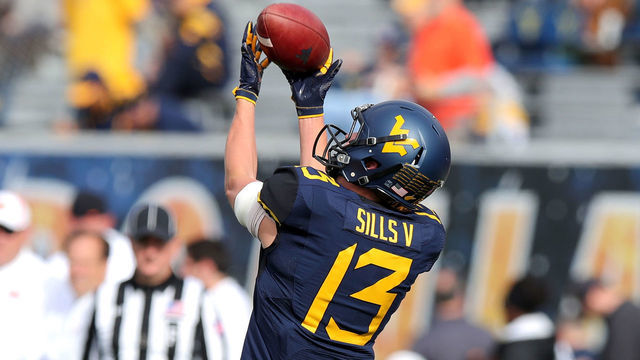 MORGANTOWN, WV - OCTOBER 28: West Virginia Mountaineers wide receiver David Sills V (13) catches a pass in warm-ups prior to the college football game between the Oklahoma State Cowboys and the West Virginia Mountaineers on October 28, 2017, at Mountaineer Field at Milan Puskar Stadium in Morgantown, WV. Oklahoma State defeated West Virginia 50-39.