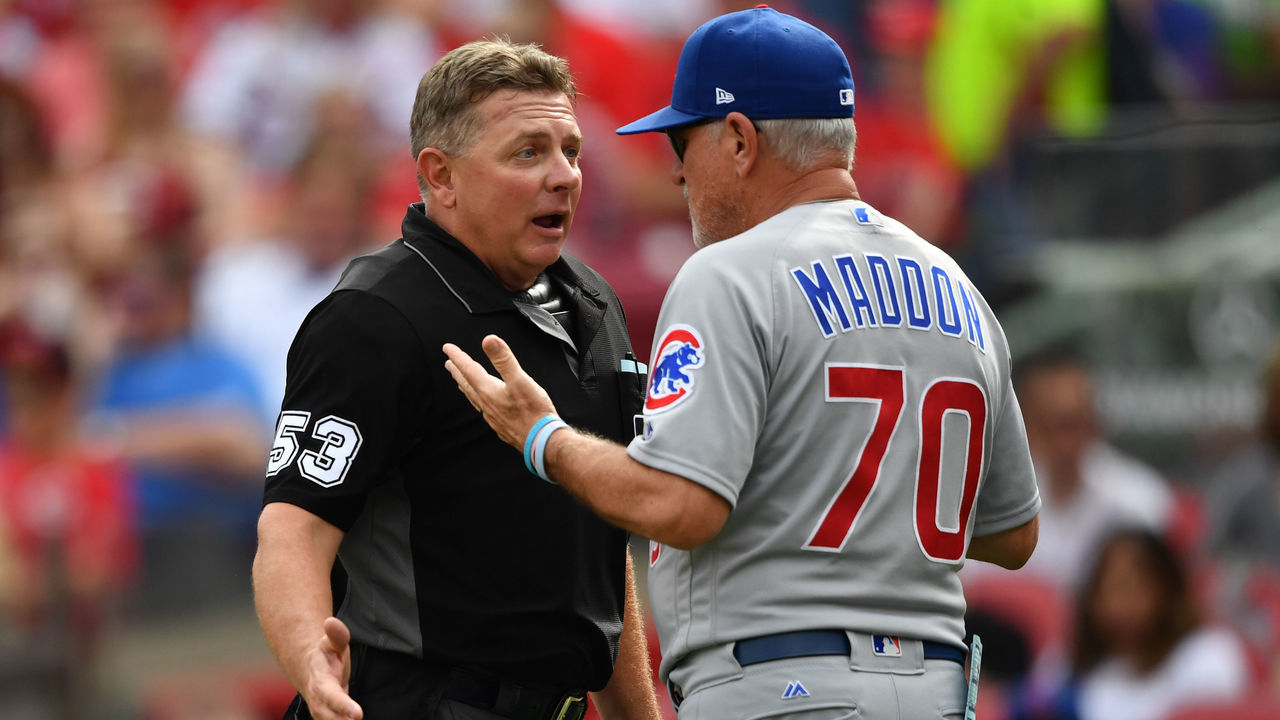 CINCINNATI, OH - JUNE 23: Home plate umpire Greg Gibson has a discussion with Manager Joe Maddon #70 of the Chicago Cubs in the fourth inning during a game against the Cincinnati Reds at Great American Ball Park on June 23, 2018 in Cincinnati, Ohio. Cincinnati defeated Chicago 11-2.