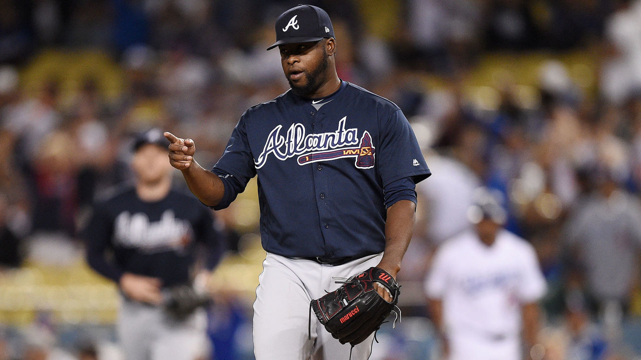 LOS ANGELES, CA - JUNE 09: Relief pitcher Arodys Vizcaino #38 of the Atlanta Braves points to short stop Dansby Swanson #7 of the Atlanta Braves to celebrate after the last out of the baseball game against Los Angeles Dodgers at Dodger Stadium on June 9, 2018 in Los Angeles, California.