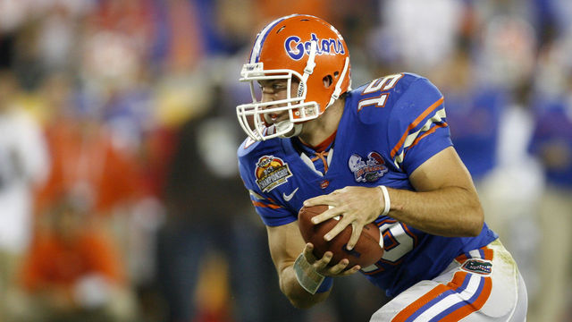 08 JAN 2007: Tim Tebow (15) of the University of Florida races towards the end zone for a touchdown against the Ohio State Buckeyes during the BCS National Championship game held at University of Phoenix Stadium in Glendale, AZ. Florida defeated OSU 41-14 for the national title. Jamie Schwaberow/NCAA Photos via Getty Images.