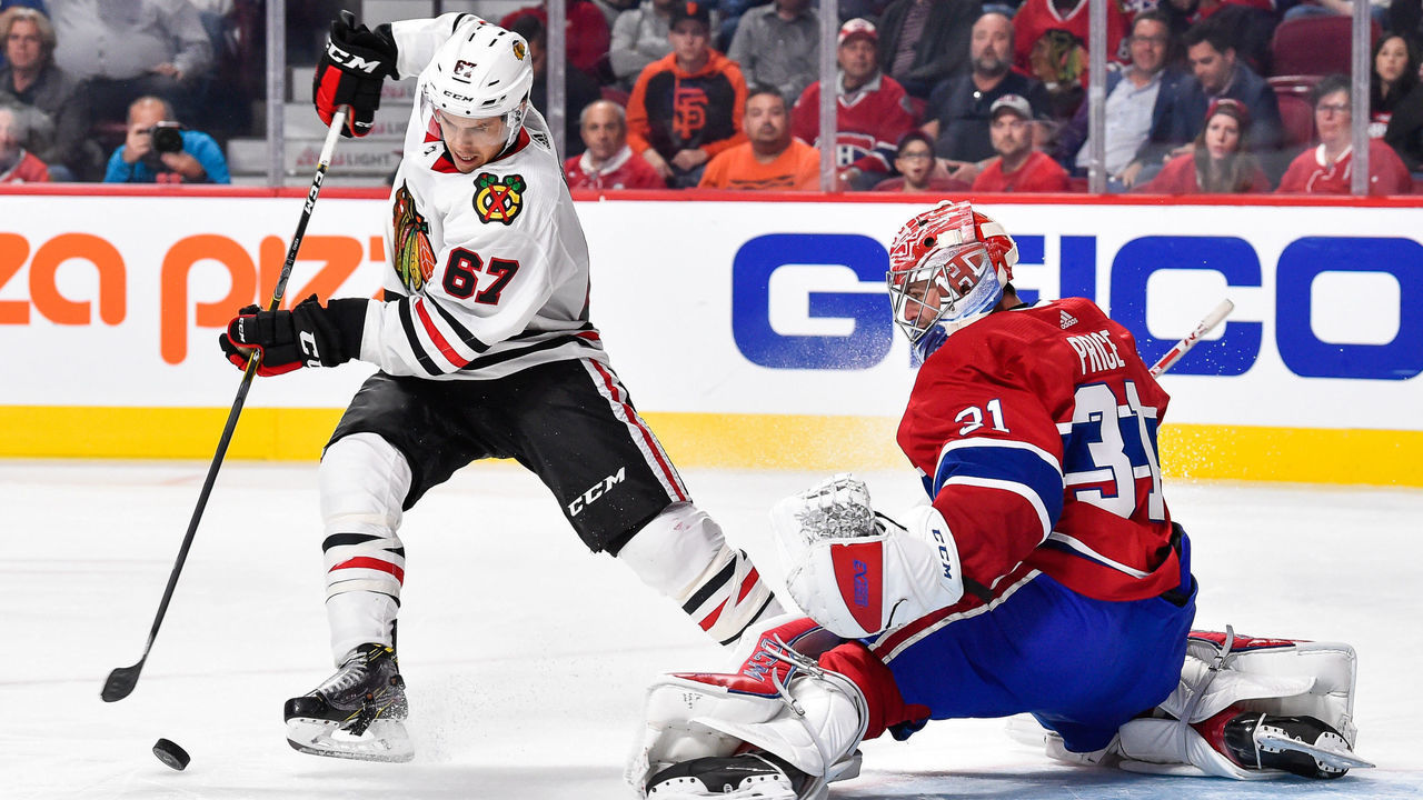 MONTREAL, QC - OCTOBER 10: Tanner Kero #67 of the Chicago Blackhawks tries to get a shot on goaltender Carey Price #31 of the Montreal Canadiens during the NHL game at the Bell Centre on October 10, 2017 in Montreal, Quebec, Canada. The Chicago Blackhawks defeated the Montreal Canadiens 3-1.