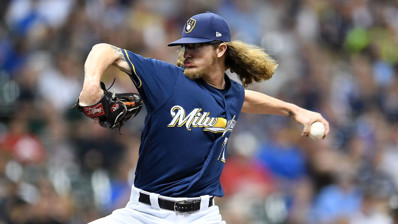 MILWAUKEE, WI - SEPTEMBER 26: Josh Hader #71 of the Milwaukee Brewers throws a pitch during the fifth inning of a game against the Cincinnati Reds at Miller Park on September 26, 2017 in Milwaukee, Wisconsin.