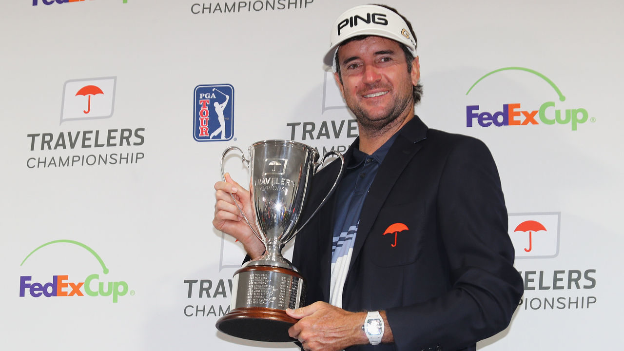 CROMWELL, CT - JUNE 24: Bubba Watson of the United States poses with the trophy after winning the Travelers Championship at TPC River Highlands on June 24, 2018 in Cromwell, Connecticut.