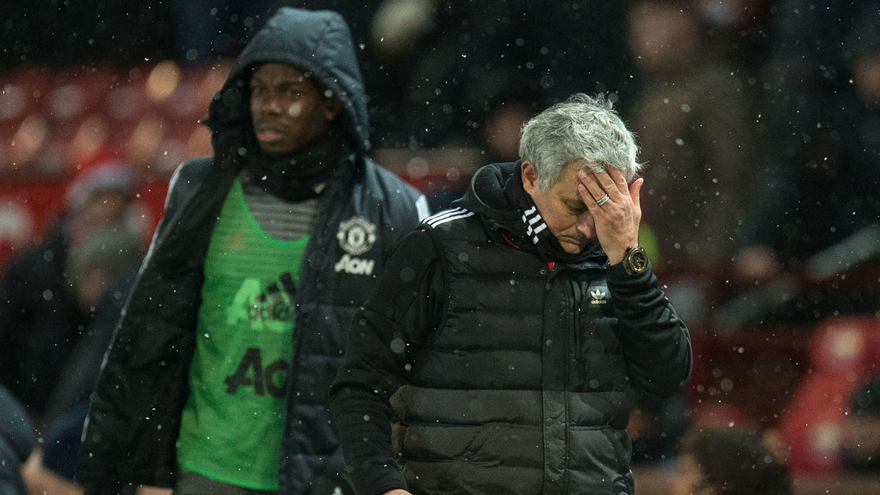 Manchester United's Portuguese manager Jose Mourinho (R) and French midfielder Paul Pogba leave after the English FA Cup quarter-final football match between Manchester United and Brighton and Hove Albion at Old Trafford in Manchester, north west England, on March 17, 2018. / AFP PHOTO / Oli SCARFF /